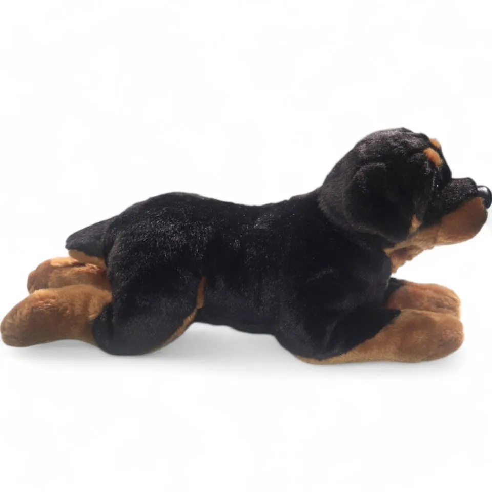 Kuscheltier Rottweiler Hund liegend