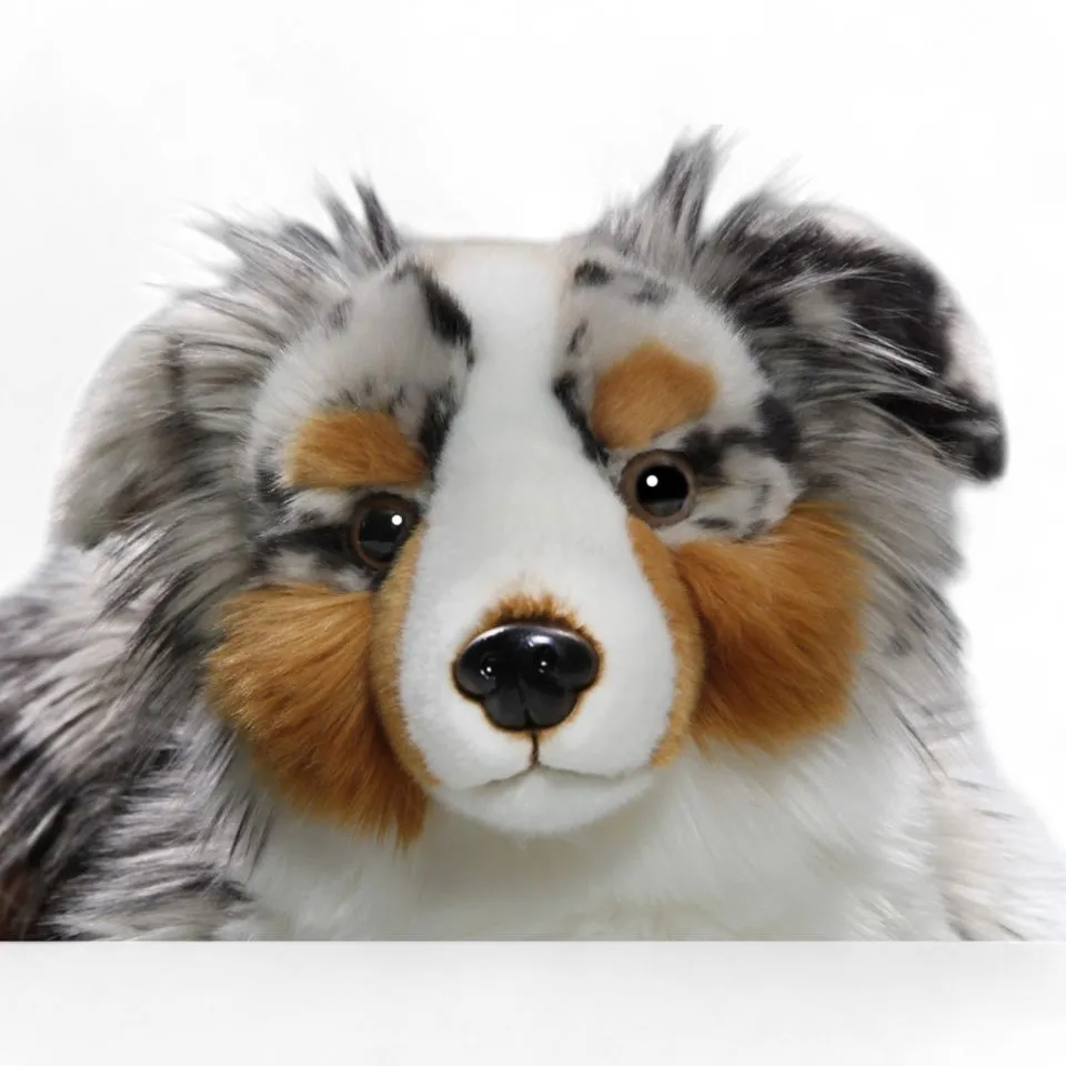 Stuffed Animal Australian Shepherd Dog lying