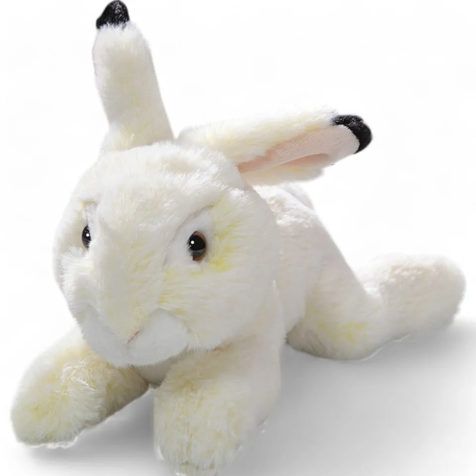 Stuffed Animal Rabbit Bunny lying beige